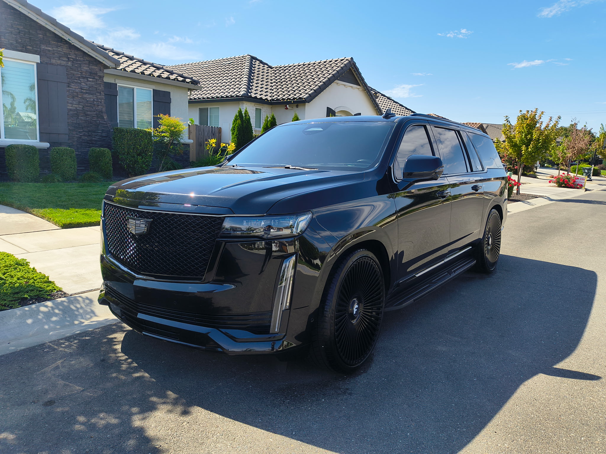Professional detailing on black Cadillac Escalade